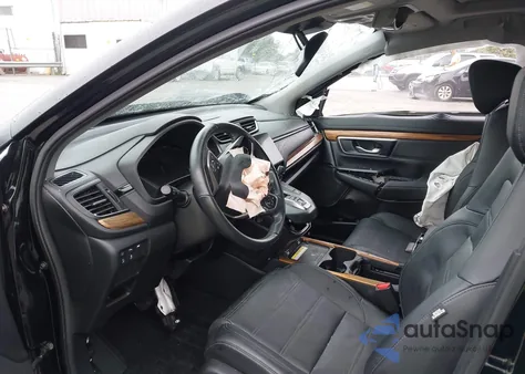 2020 Honda Cr-V Hybrid Touring z USA, uszkodzony, nr VIN 7FART6H95LE004172